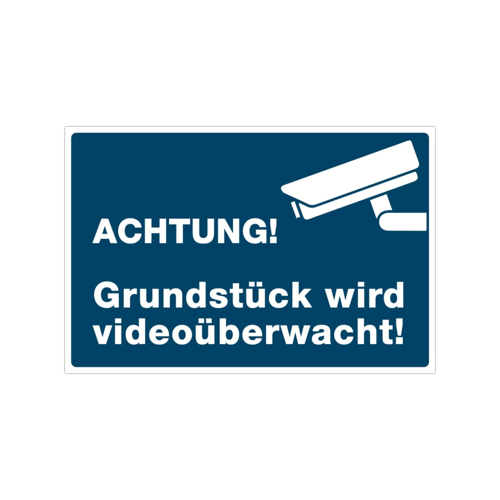 Drei signalblaue Aufkleber mit "Achtung! Grundstück wird videoüberwacht!" in 300x200 mm Größe, auf glatter Oberfläche.