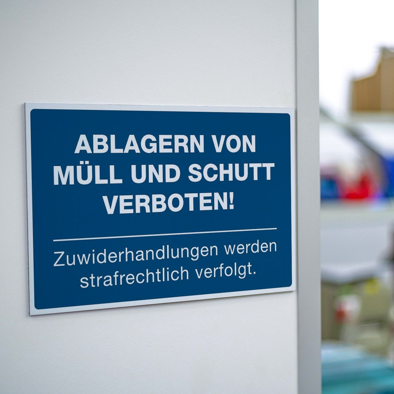 Schild Alu-Verbund Ablagern von Müll und Schutt verboten! (signalblau, 300x200x4 mm)