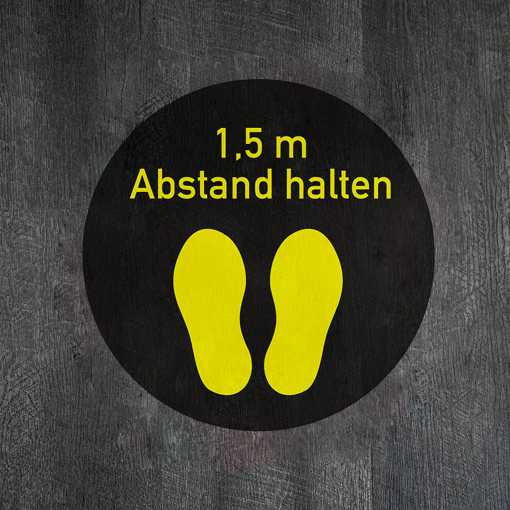 Gelber Fußbodenaufkleber mit "Abstand halten" für 1,5m Abstand, 300x300 mm, vom aufkleberdrucker.de.